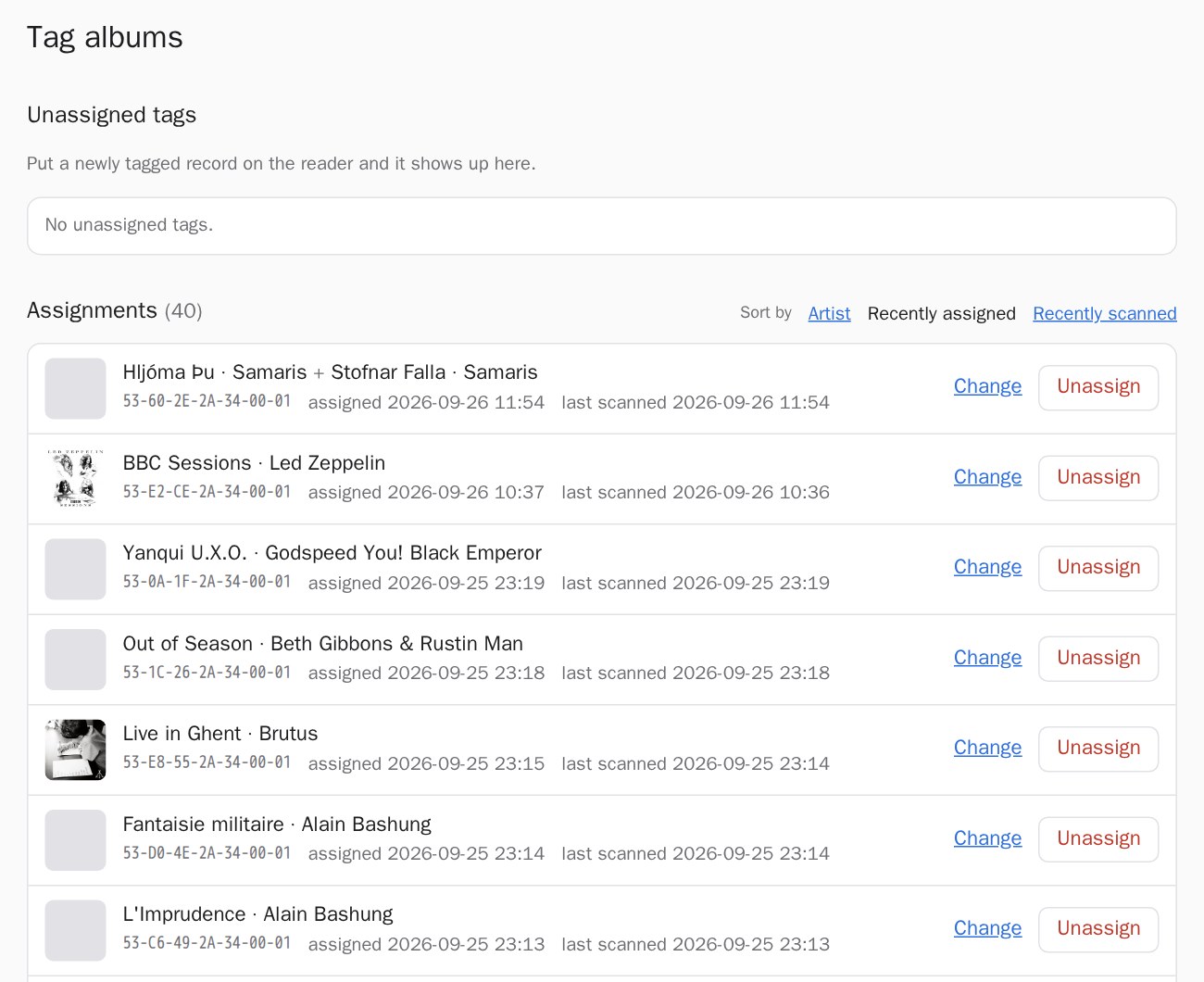 The tag-albums web page: an empty Unassigned tags list, then 40 assignments sorted by most recently assigned, each with a cover or grey placeholder, the album and artist, the tag ID, and when it was assigned and last scanned
